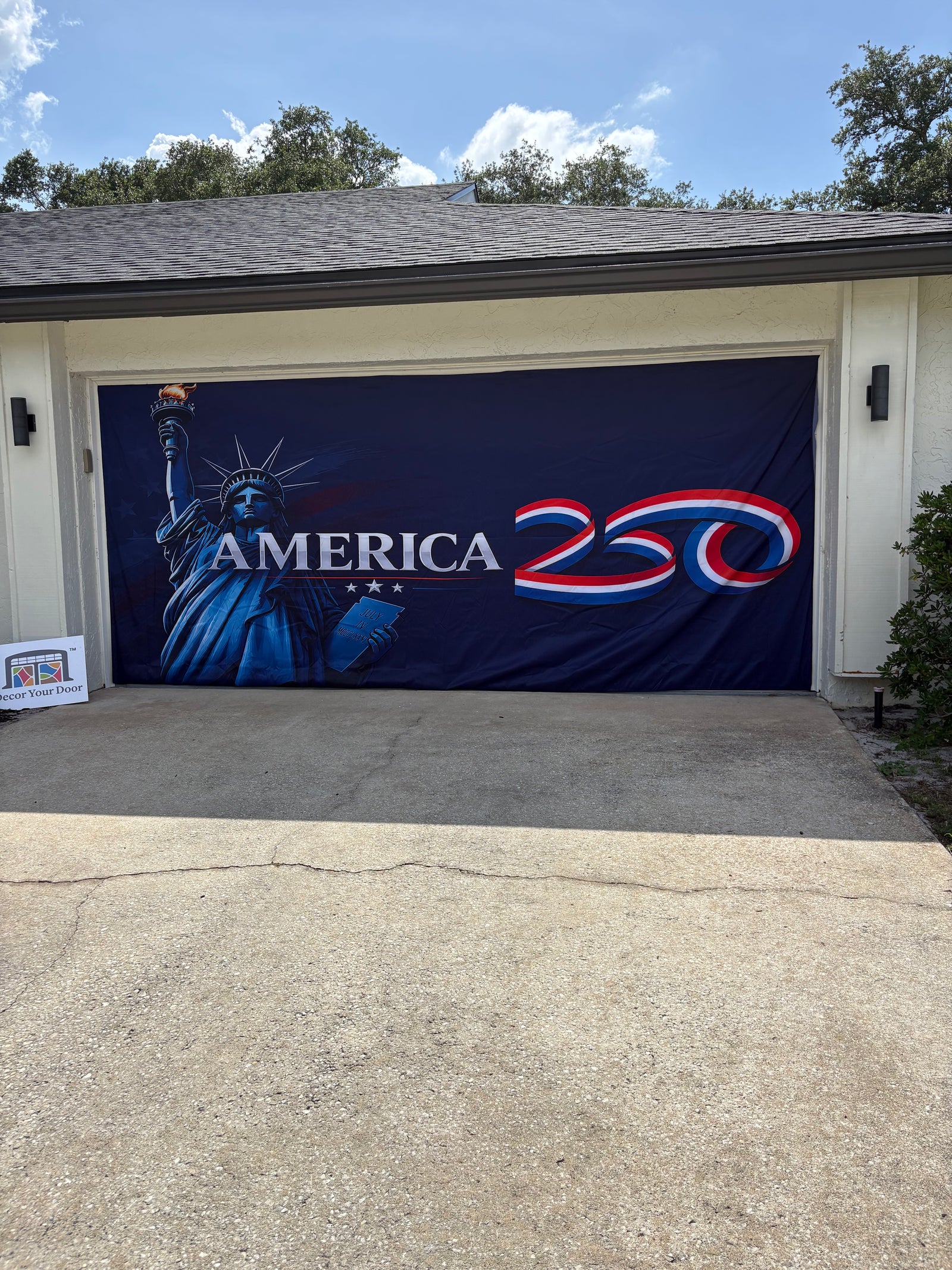 Decor Your Door premium garage door cover displayed on a home