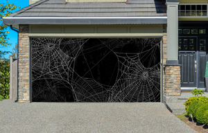 Silueta de telaraña sobre pared negra, decoración para puerta de garaje